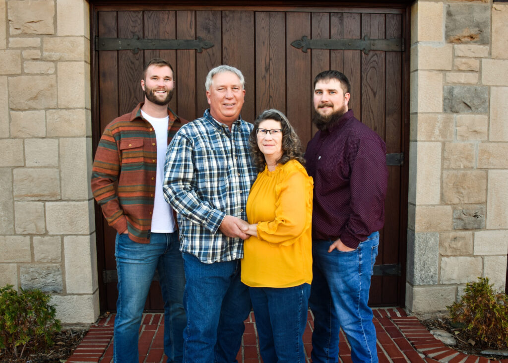 Immediate family of 4 taking winter photos at Lydie's Cottage