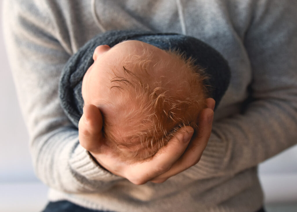 studio newborn session, baby with head of hair