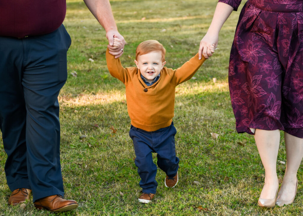 family-session-holding-hand-lydies-cottage