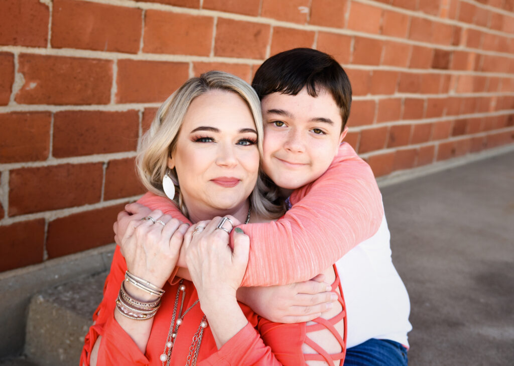 family-session-mother-and-son-hugging-downtown-ponca-city