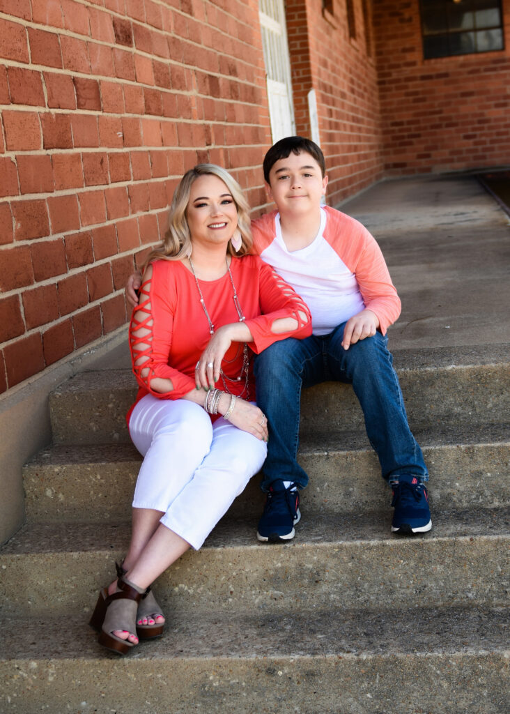 family-session-mother-and-son-sitting-on-steps-downtown-ponca-city